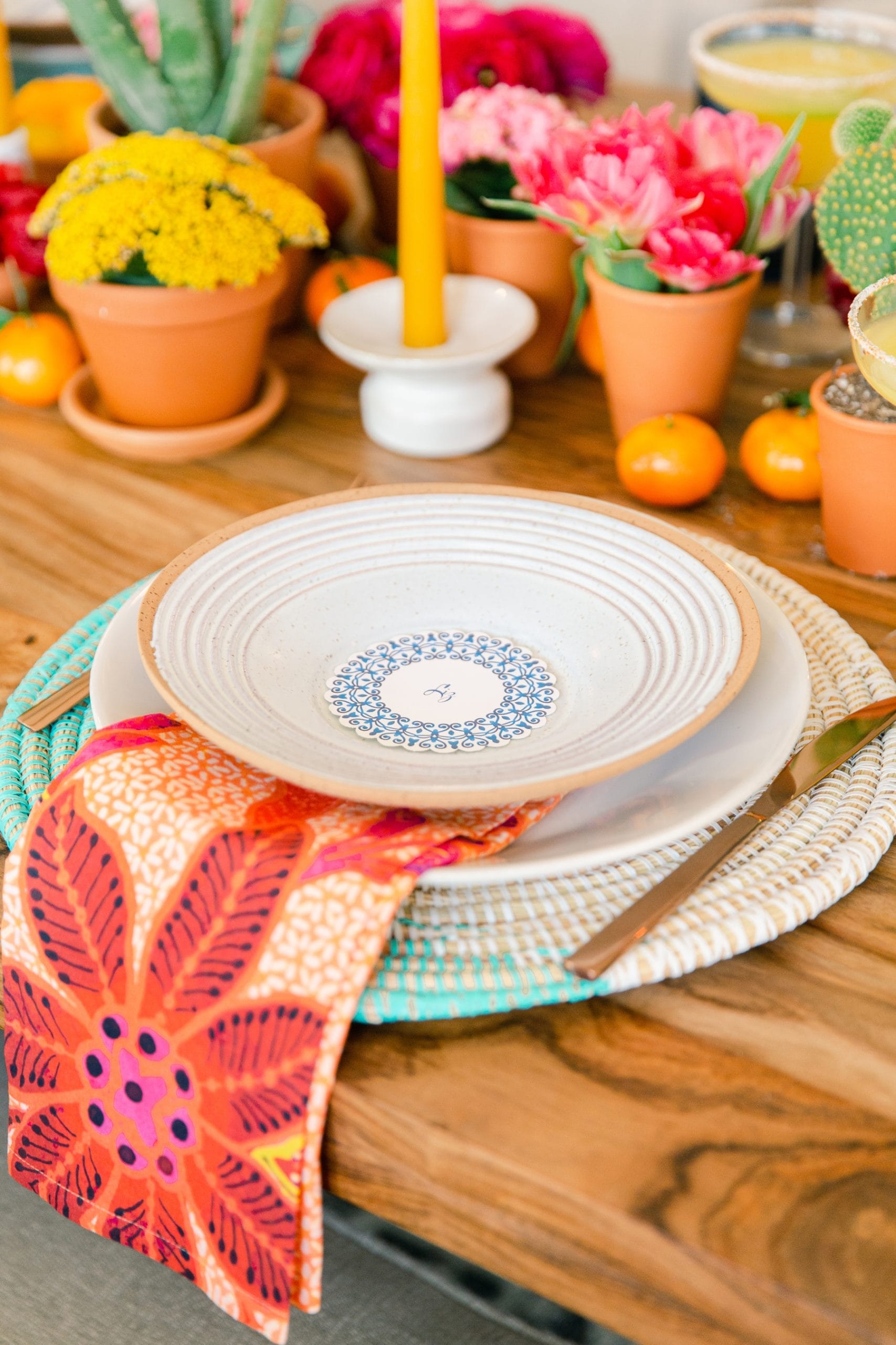 Bright cheerful colorful cinco de mayo inspired tablescape dinner table 